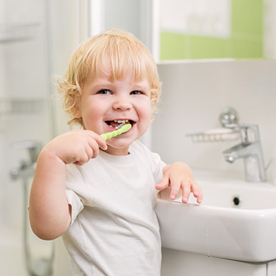 Boy brushing his teeth